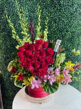 Arrangement of Red Roses And a Bottle of Champagne 