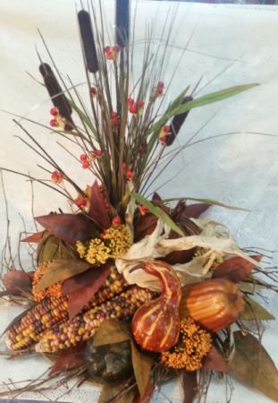 Artificial centerpiece with indian corn 