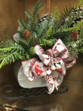 Artificial Christmas Greens in Sled Christmas