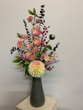 Artificial...not real Spring Has Sprung Silk flower arrangement
