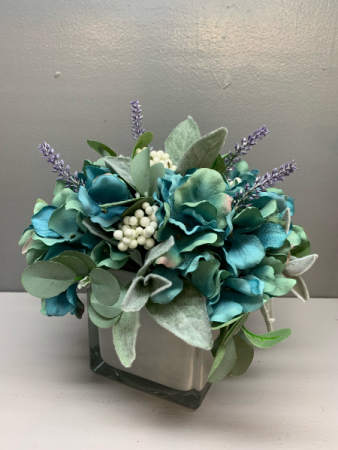 Artificial silk arrangement glass white cube Teal, white and lavender silk flower arrangement