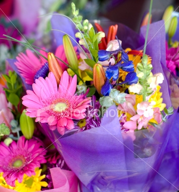 Mixed flowers wrapped in pretty paper!! Spring Mix of colors!