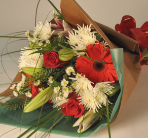 Assorted Christmas Flowers Loose Wrapped Bouquet in Plum, PA