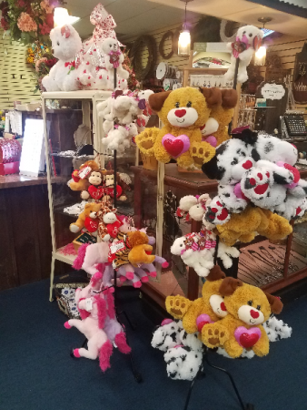 flowers with stuffed animals
