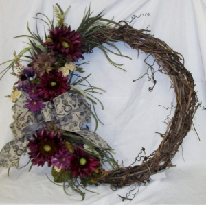 Aubergine Sunflower Wreath Permanent Arrangement by Inspirations Floral Studio in Lock Haven, PA | INSPIRATIONS FLORAL STUDIO Aubergine Sunflower Wreath Permanent Arrangement by Inspirations Floral Studio in Lock Haven, PA | INSPIRATIONS FLORAL STUDIO