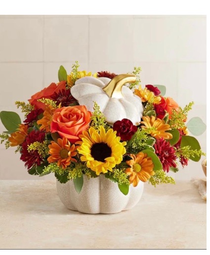 Autumn pumpkin white flower arrangement 