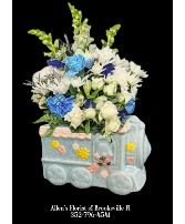 Baby Boy's First Train Fresh cut flowers in a ceramic container