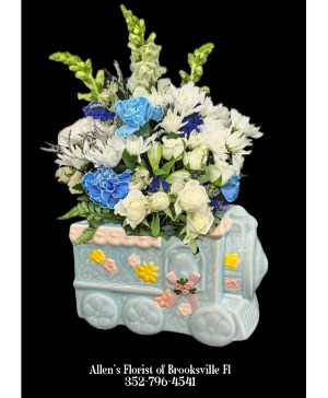 Baby Boy's First Train Fresh cut flowers in a ceramic container