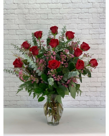 BE MINE DOZEN RED ROSES WITH PINK WAXFLOWER