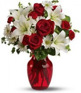    Rosy Delight  A bouquet of ruby red roses and white lilies