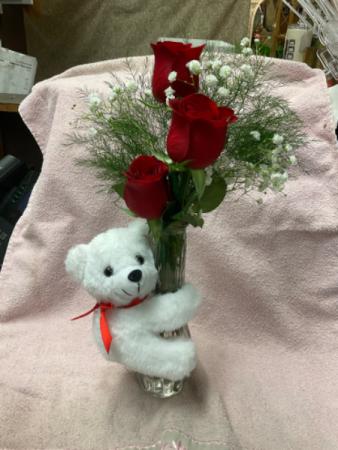 Bear hug Stuffed bear with roses