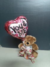 bear with candy and balloon gift
