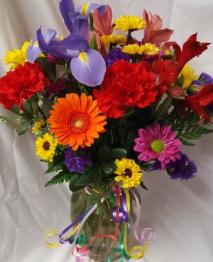 Pop of Color Bouquet! Mixture of long lasting Bright flowers arranged in a vase!!