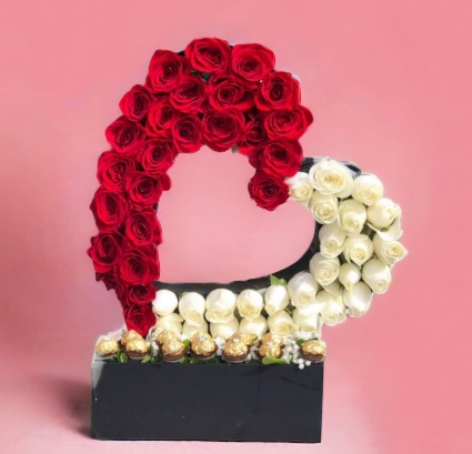 Beautiful heart with white and red roses 