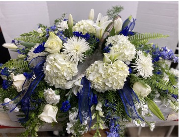 Beautiful in Blue Casket Spray in Osage, IA | Osage Floral & Gifts