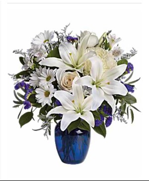 Beautiful in blue white and blue flowers in blue vase