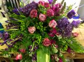 Beautiful in Purples and Greens Family Casket Spray