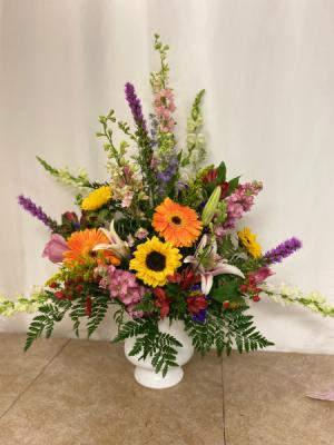 Beautiful Urn Urn filled with a mixture of flowers