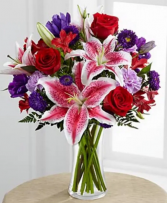 Beauty blooms bouquet  Vase some flowers will be substituted 