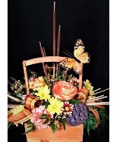 Beauty of fall basket arrangement