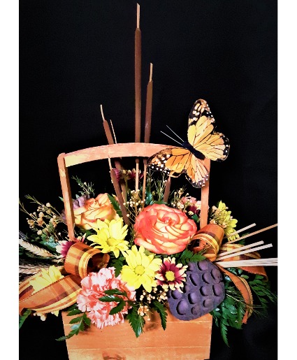 Beauty of fall basket arrangement