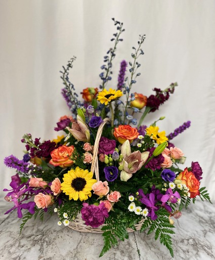 Beauty Personified Mixed florals in a basket