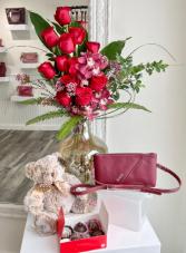 Better than Xmas- show your love! Beautiful deluxe flower arrangement roses and orchids/ beautiful hand made purse from Janell Bags/ 6 gourmet chocolate truffles/ stuffed teddy bear!!!