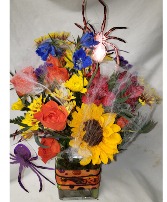 HALLOWEEN DELIGHT...cute ribbon detail on vase wit Bright fall flowers ans Halloween trim!