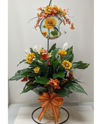 Bird Feeder with Green Plant