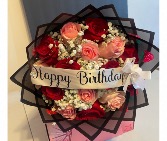 Birthday wishes  Roses, baby breath hand bouquet 