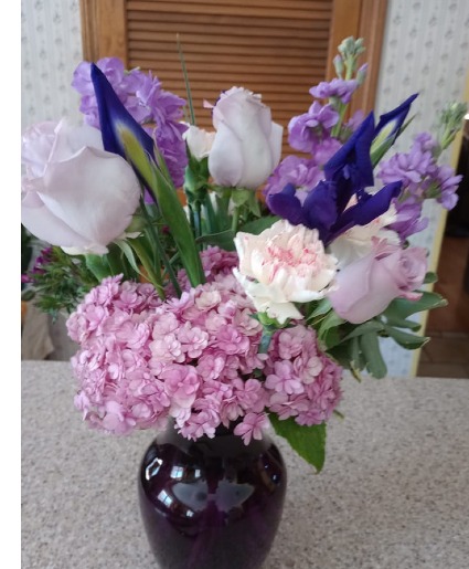 Birthstone bouquet for February Vase of flowers