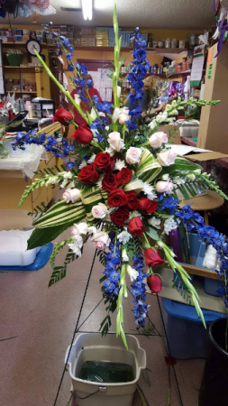 Blue and Red Standing Easle Memorial Piece in Mountain Home, AR | BOUQUET PALACE