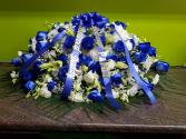 blue and white  casket cover 