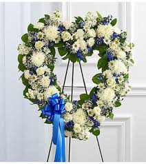 BLUE AND WHITE OPEN HEART 1 FUNERAL PIECE WAS $225.00/NOW 150.00