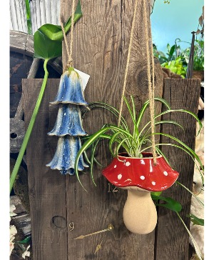 Blue bells and a shroom.  Hanging plant and wind chime