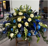 Blue Candlelight Sunrise Casket Spray