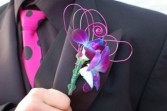 Blue orchid Boutonniere