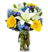 Blue skies vase of flowers 