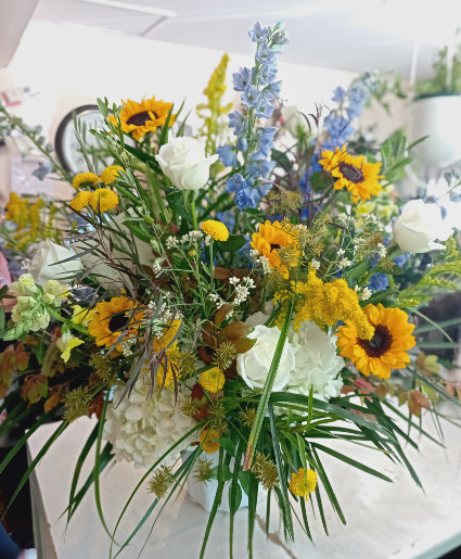 Blue, Yellow and White Sympathy Arrangement Designer's Choice
