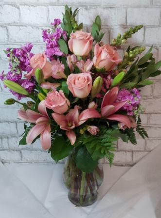 Blushing Beauty Roses and lilies 