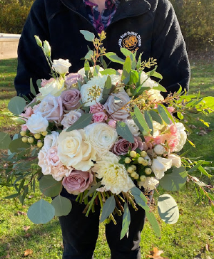 Blushing Bride  A bridal bouquet of mauve, blush, and cream. 
