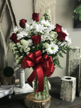bouquet of red and white  red roses , white daises , white filler 