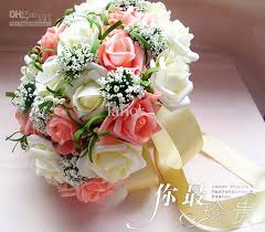 Bouquet of White and Peach Roses For both a Bride and can be made smaller for your girls..prices vary due to size.