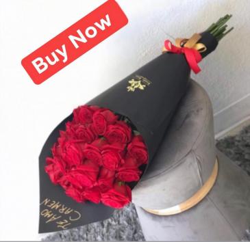 Bouquet wrapped on black paper Black wrapping paper