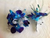 Boutiner and Wrist Corsage Combo This Combo  In Dandrobium Orchids Only..You Can Choose , White , Pink , Or Blue 