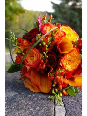 Bride's bouquet of mainly roses/w fillers in any color combo