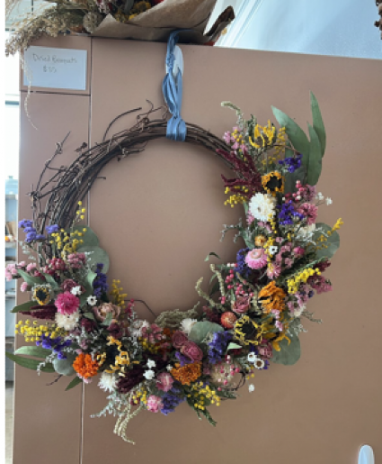 Bright and bold dried floral wreath 