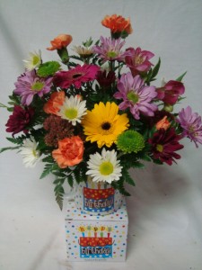 Bright flowers in a keepsake Happy Birthday Mug! 
