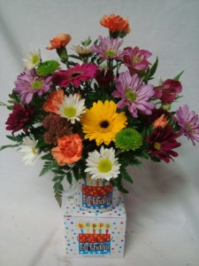 Bright flowers in a keepsake Happy Birthday Mug!