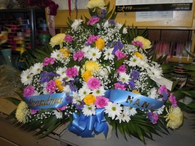 Bright Mix Flowers (TB 12) Funeral Basket